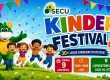 Kinderen en de SECU-mascotte tijdens het gratis Kinder Festival in Utrecht.